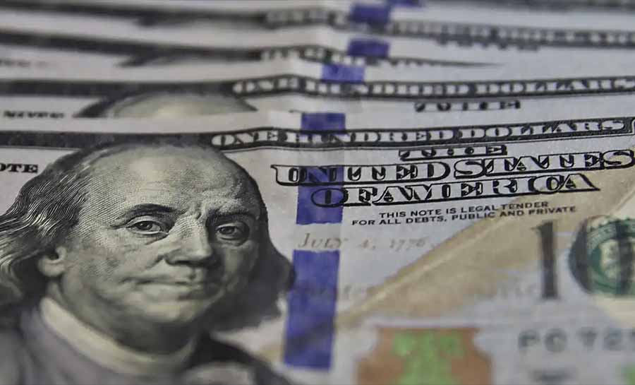 Dólar cai para R$ 6,04 com inflação moderada nos EUA