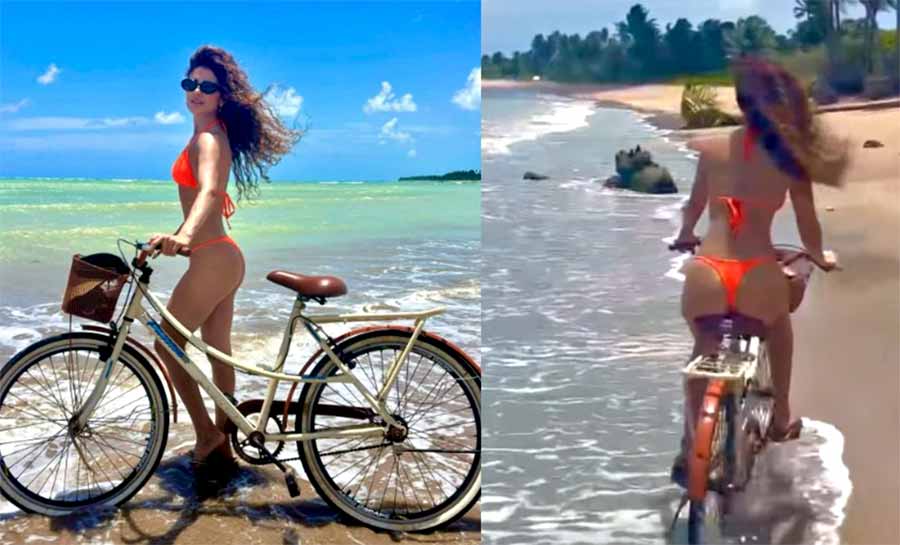 Paula Fernandes faz charme durante passeio de bicicleta na praia